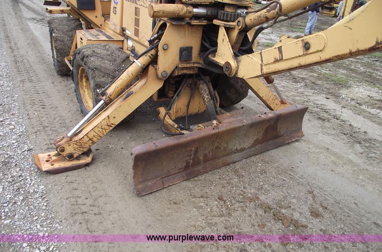 image for item 5437 Case 660 hoe and offset cable plow