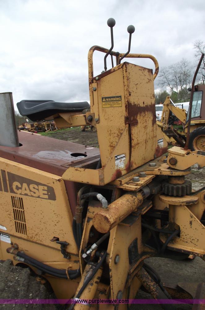 image for item 5437 Case 660 hoe and offset cable plow
