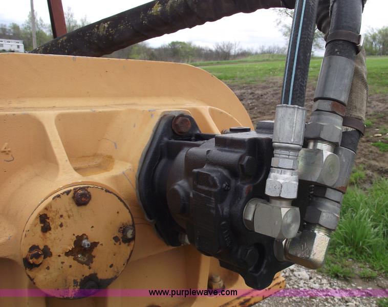 image for item 5437 Case 660 hoe and offset cable plow