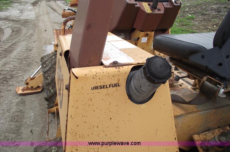 image for item 5437 Case 660 hoe and offset cable plow