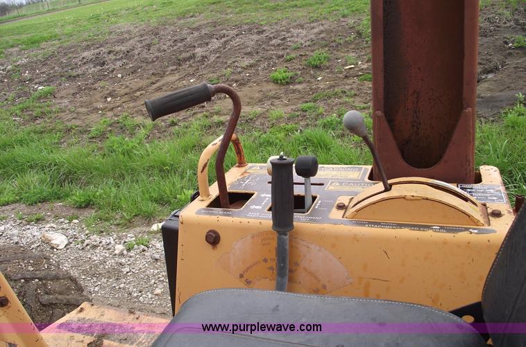 image for item 5437 Case 660 hoe and offset cable plow
