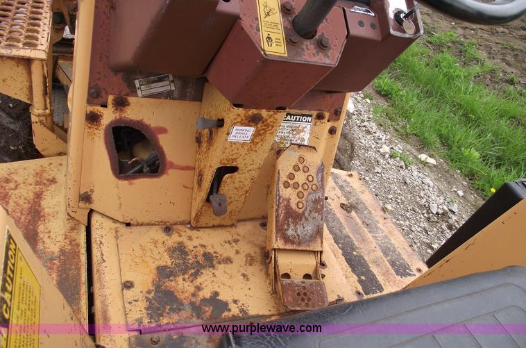 image for item 5437 Case 660 hoe and offset cable plow