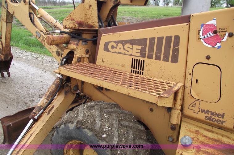 image for item 5437 Case 660 hoe and offset cable plow