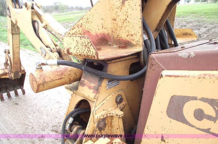 image for item 5437 Case 660 hoe and offset cable plow