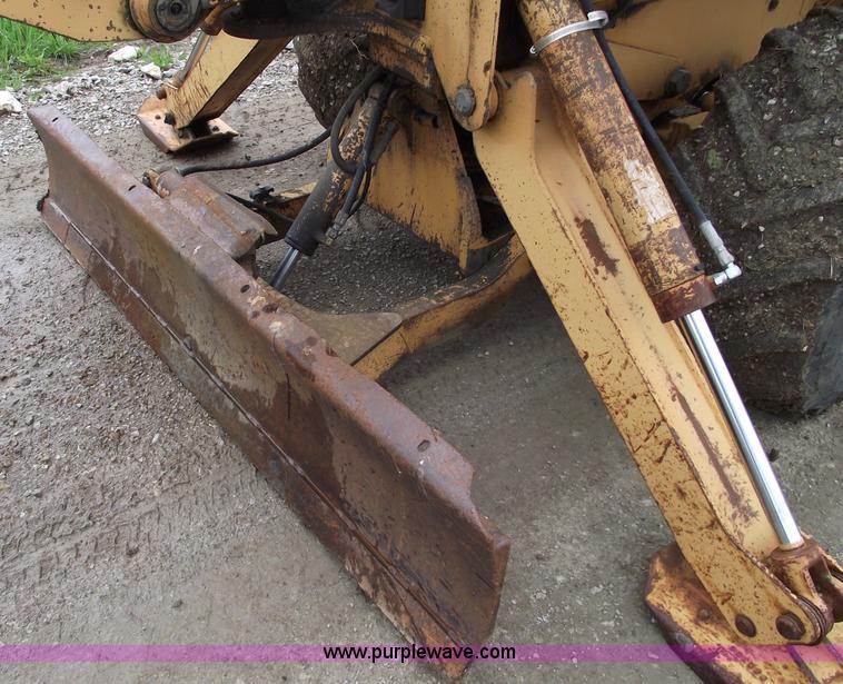 image for item 5437 Case 660 hoe and offset cable plow