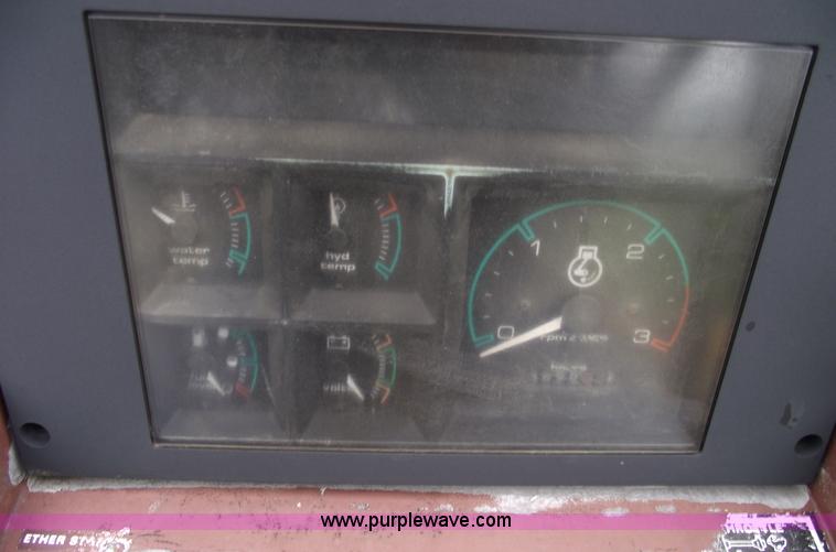 image for item 5437 Case 660 hoe and offset cable plow