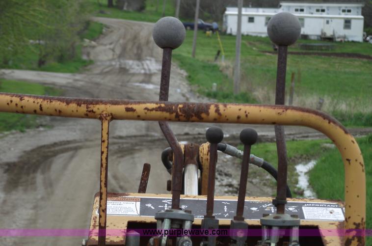 image for item 5437 Case 660 hoe and offset cable plow