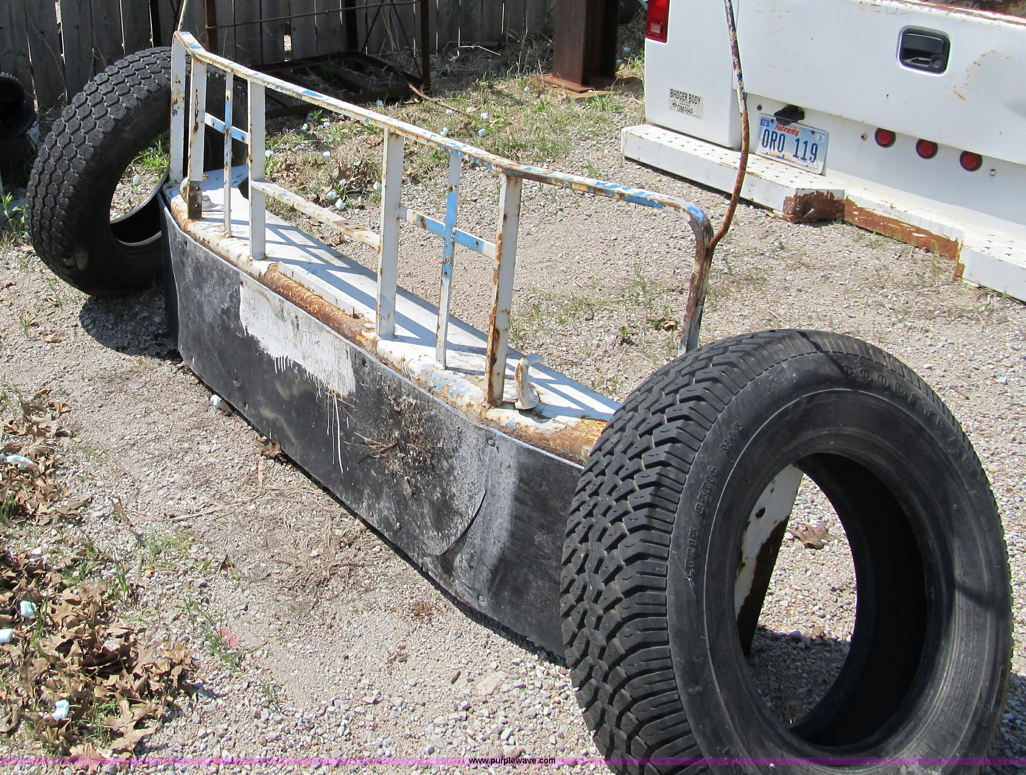Truck bumper and tires in Omaha, NE Item 8984 sold Purple Wave