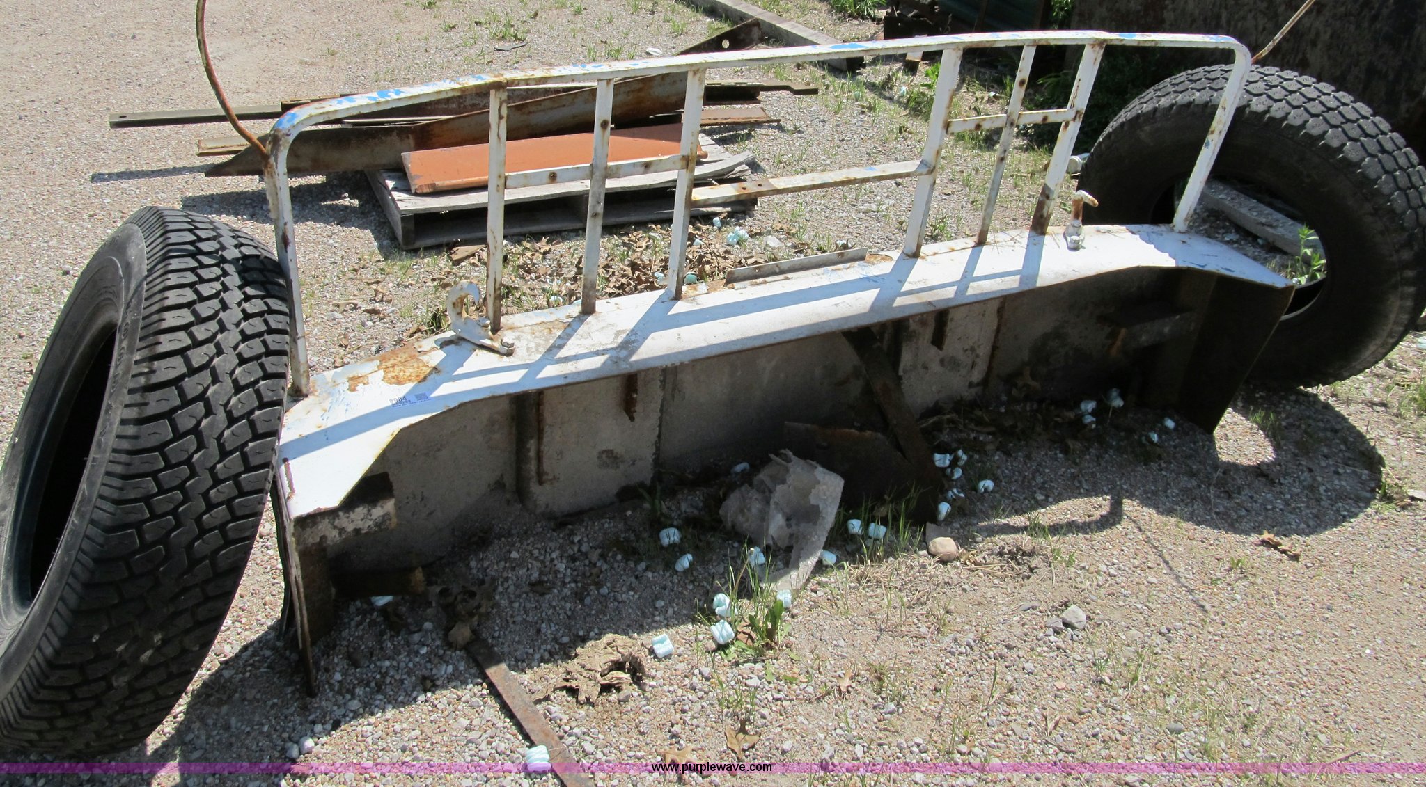 Truck bumper and tires in Omaha, NE Item 8984 sold Purple Wave