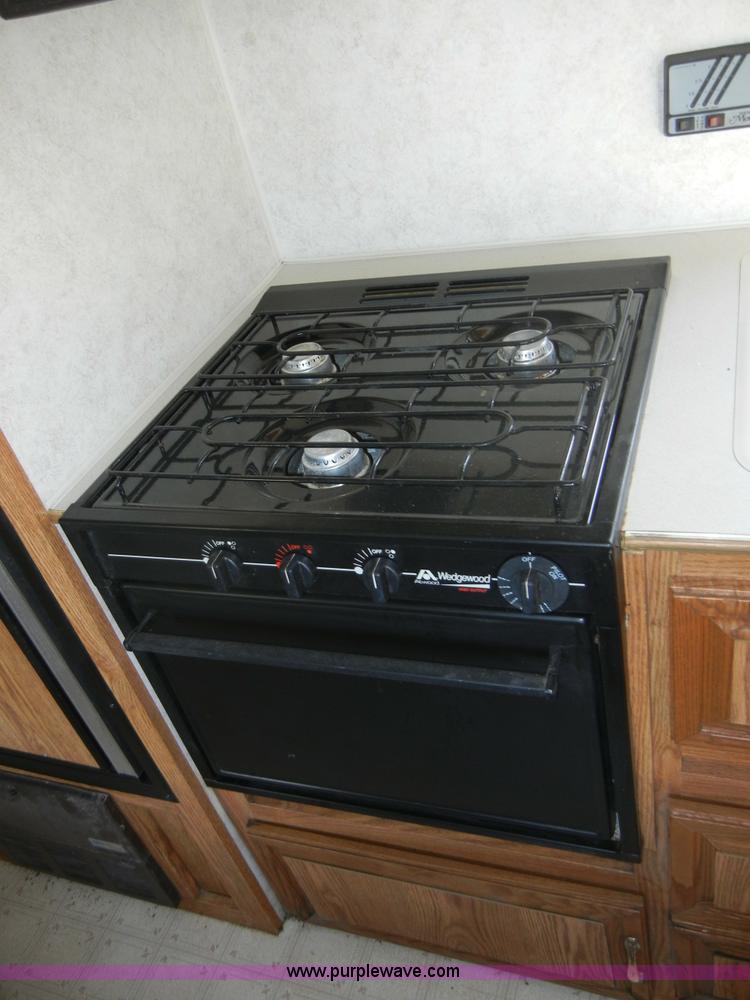 image for item 2216 1995 Damon Hornet 28' pull behind camper