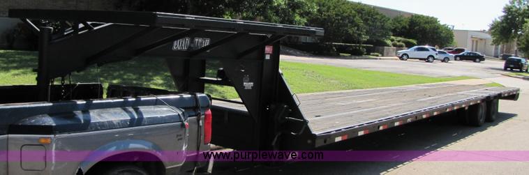 image for item 3457 2002 Load Trail 40' goose neck flatbed trailer