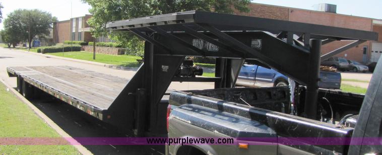 image for item 3457 2002 Load Trail 40' goose neck flatbed trailer