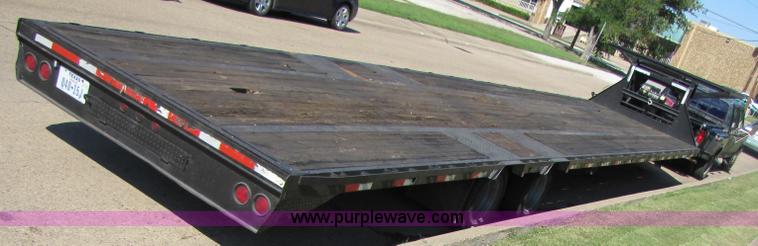 image for item 3457 2002 Load Trail 40' goose neck flatbed trailer