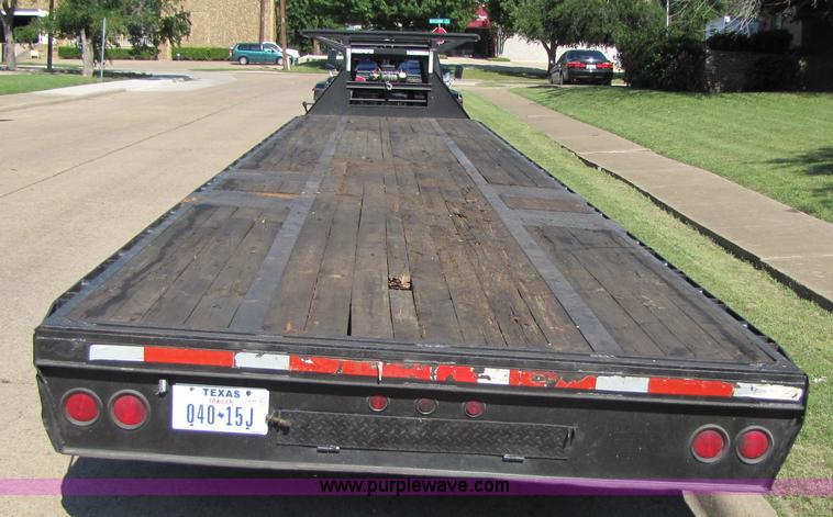 image for item 3457 2002 Load Trail 40' goose neck flatbed trailer