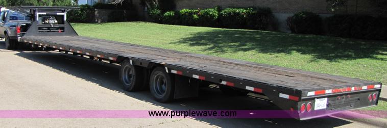 image for item 3457 2002 Load Trail 40' goose neck flatbed trailer