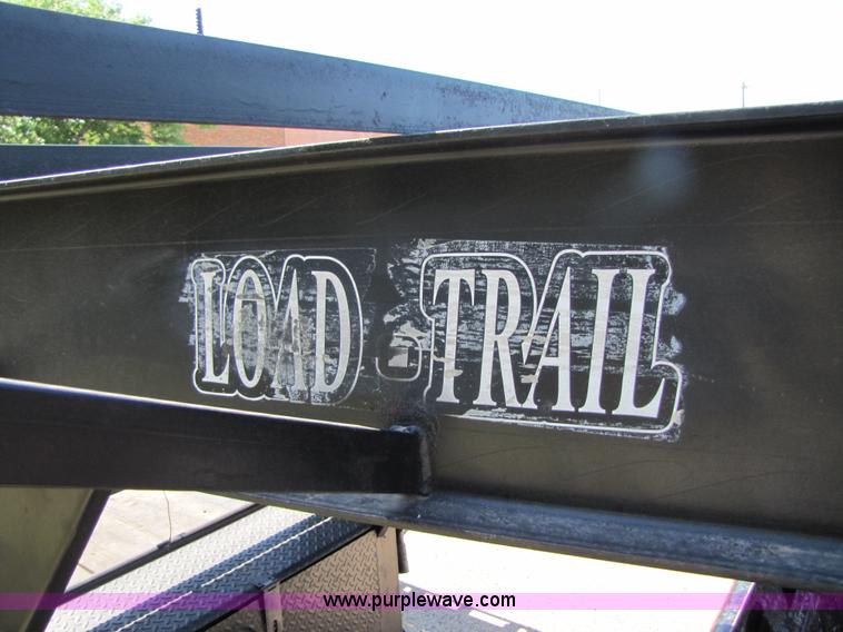 image for item 3457 2002 Load Trail 40' goose neck flatbed trailer