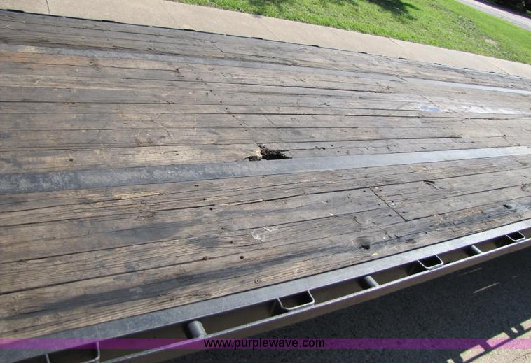 image for item 3457 2002 Load Trail 40' goose neck flatbed trailer