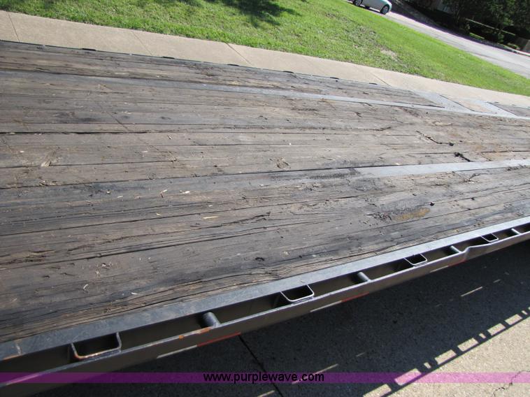 image for item 3457 2002 Load Trail 40' goose neck flatbed trailer