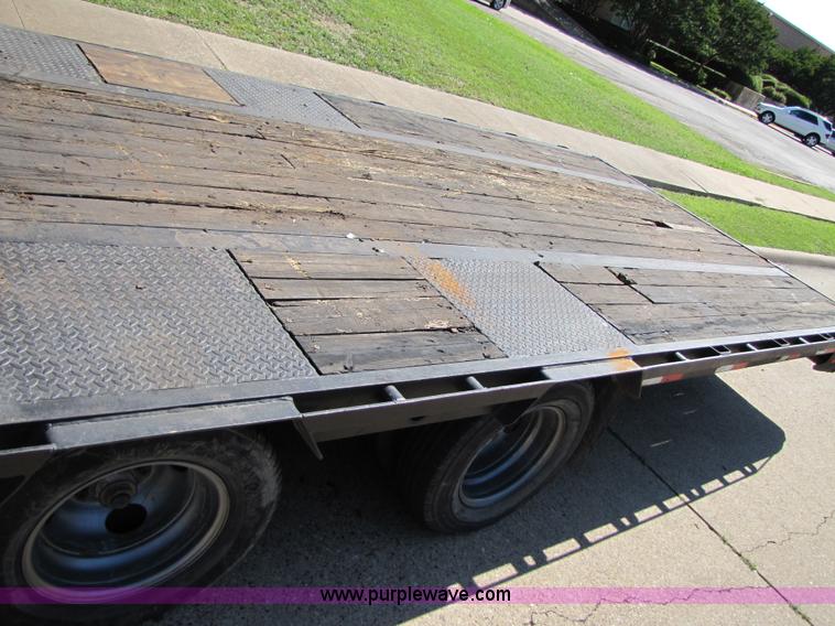 image for item 3457 2002 Load Trail 40' goose neck flatbed trailer