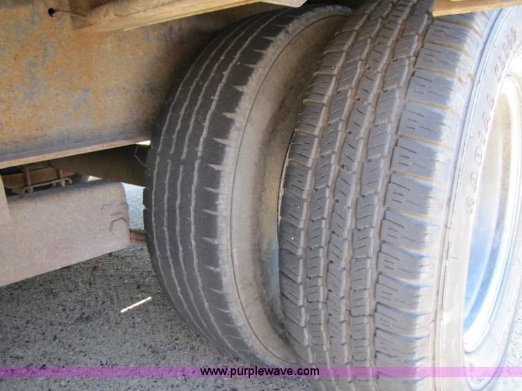 image for item 3457 2002 Load Trail 40' goose neck flatbed trailer