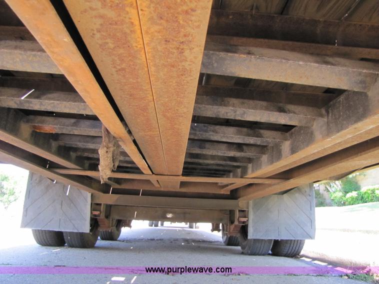 image for item 3457 2002 Load Trail 40' goose neck flatbed trailer