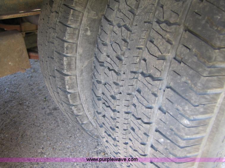 image for item 3457 2002 Load Trail 40' goose neck flatbed trailer