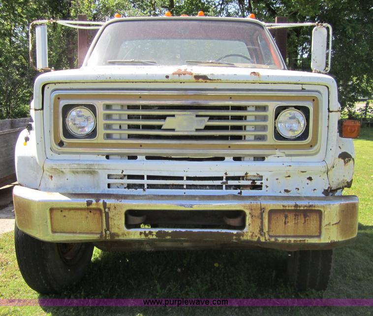 image for item 3693 1973 Chevrolet C65 flatbed rollback truck