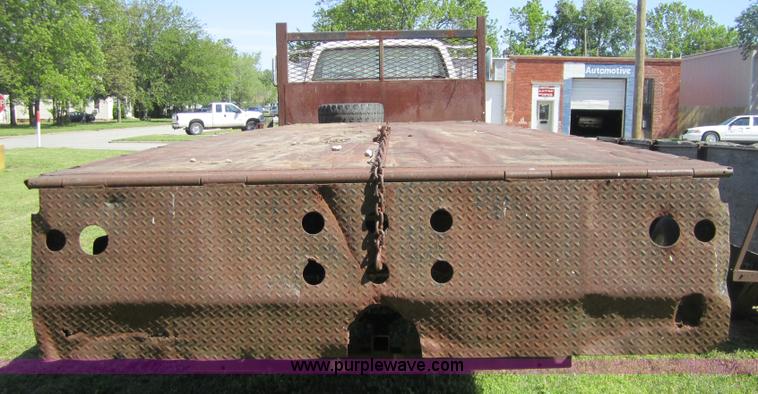 image for item 3693 1973 Chevrolet C65 flatbed rollback truck