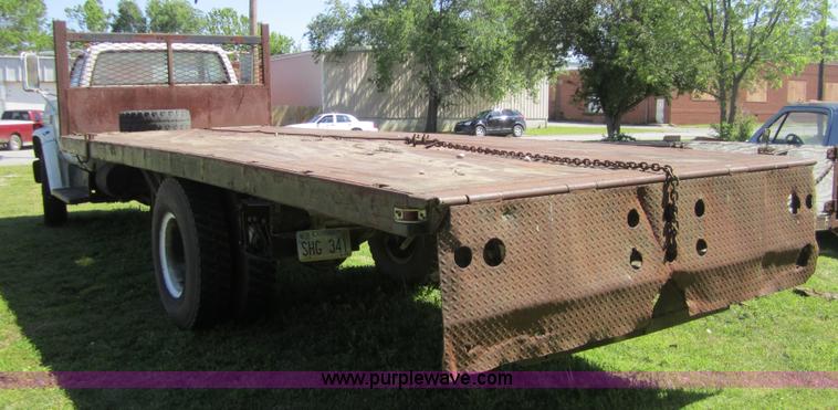 image for item 3693 1973 Chevrolet C65 flatbed rollback truck