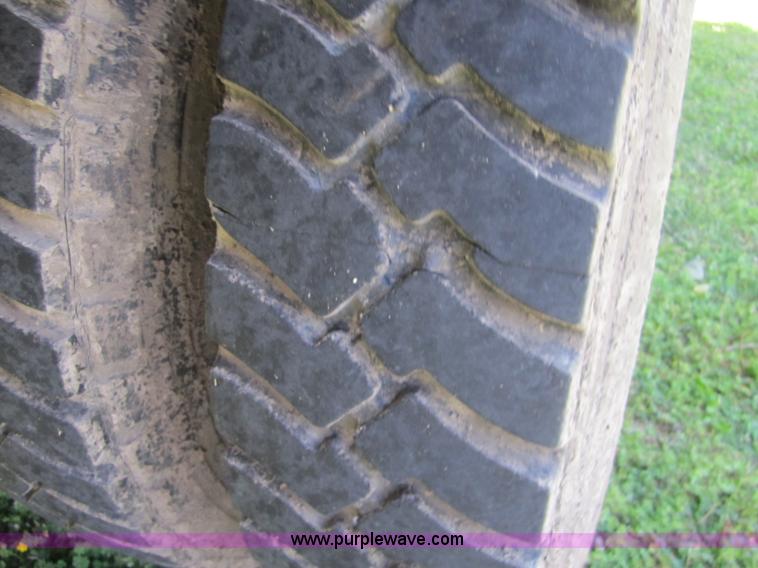 image for item 3693 1973 Chevrolet C65 flatbed rollback truck