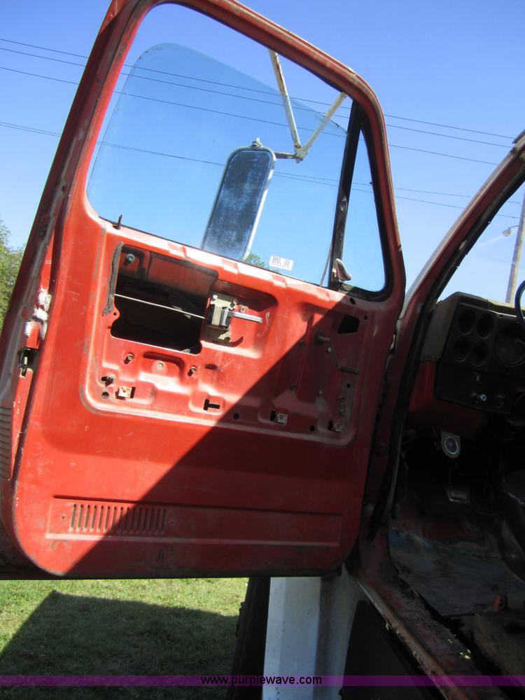 image for item 3693 1973 Chevrolet C65 flatbed rollback truck