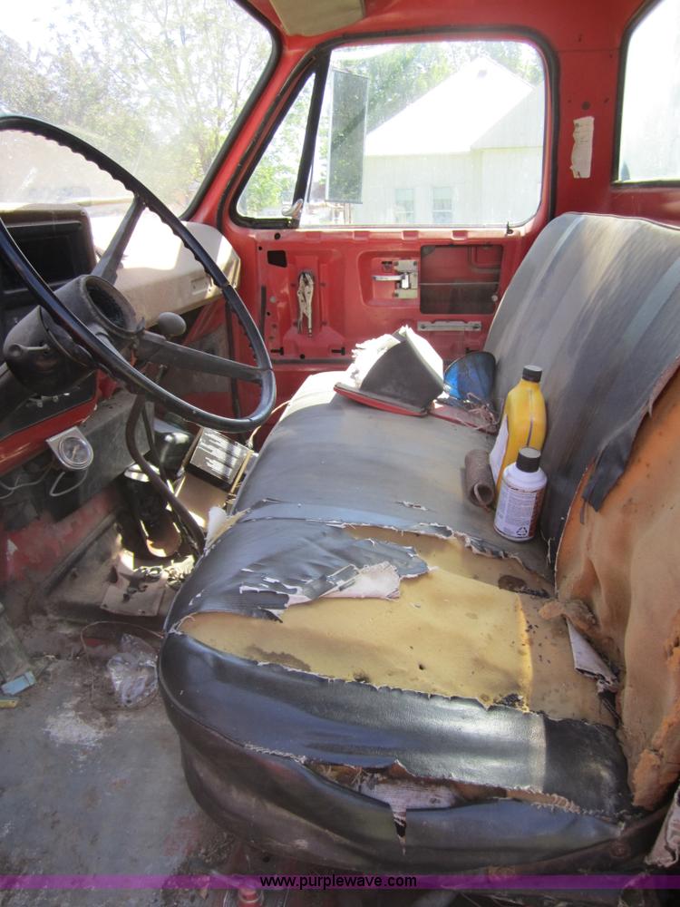 image for item 3693 1973 Chevrolet C65 flatbed rollback truck