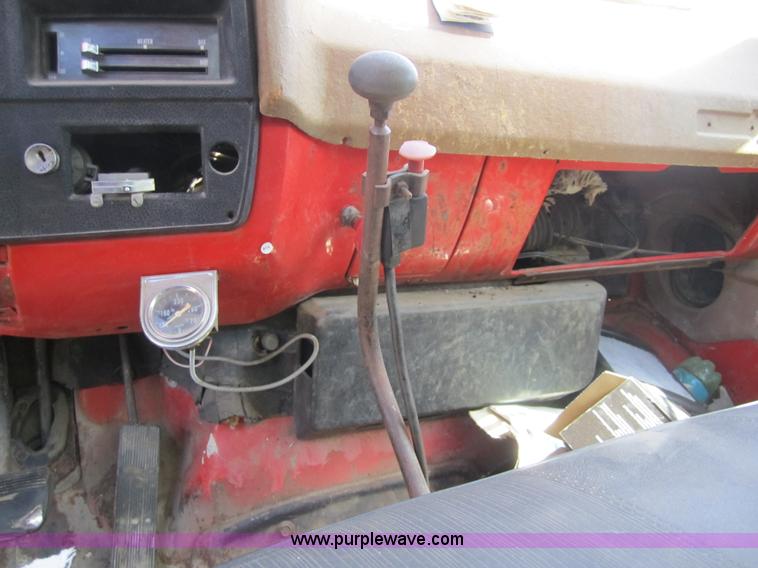 image for item 3693 1973 Chevrolet C65 flatbed rollback truck