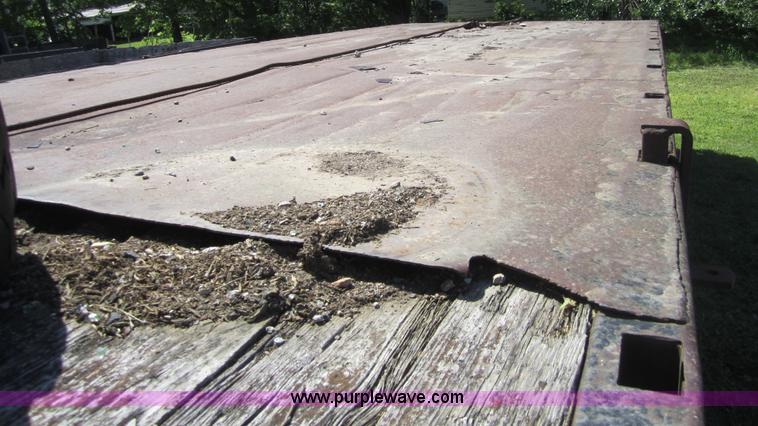 image for item 3693 1973 Chevrolet C65 flatbed rollback truck