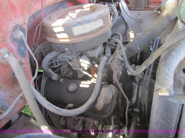 image for item 3693 1973 Chevrolet C65 flatbed rollback truck