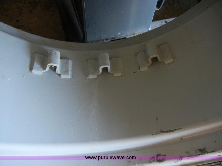 image for item 2224 New tractor tire and rim