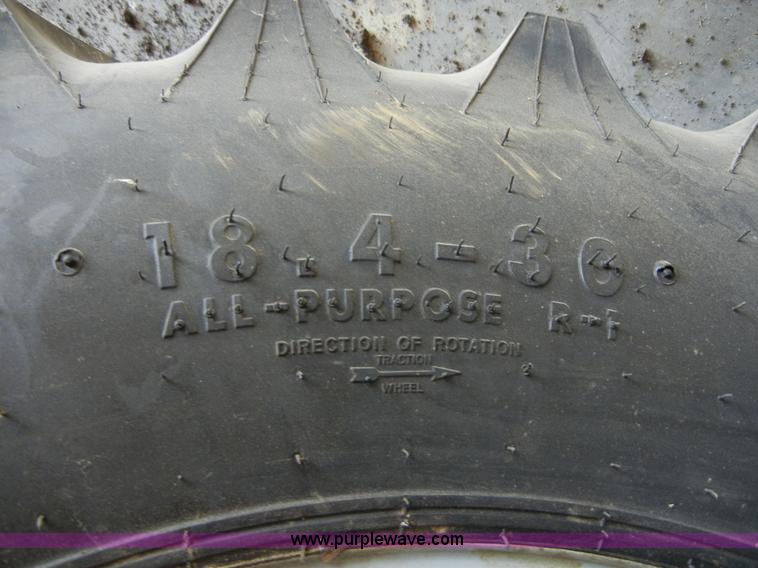 image for item 2224 New tractor tire and rim