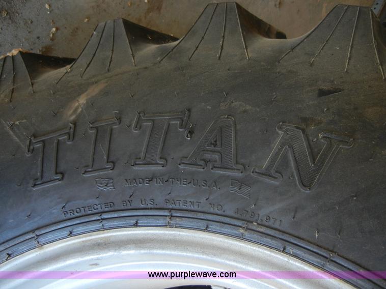 image for item 2224 New tractor tire and rim