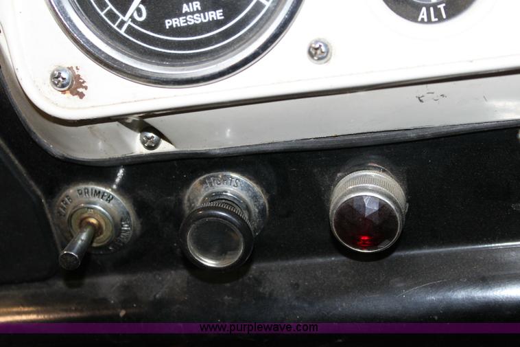 image for item 6319 1975 Ford 900 ladder truck