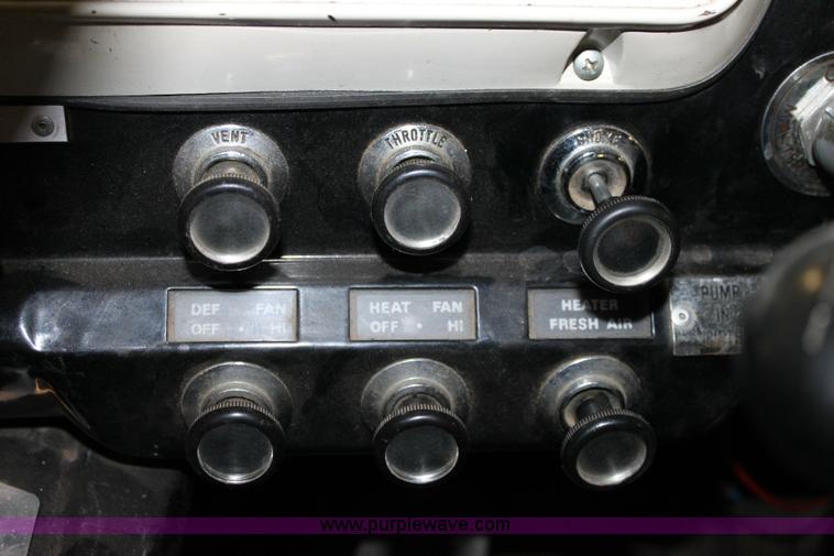 image for item 6319 1975 Ford 900 ladder truck