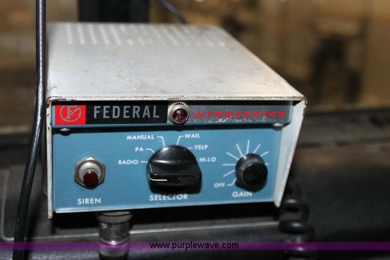 image for item 6319 1975 Ford 900 ladder truck