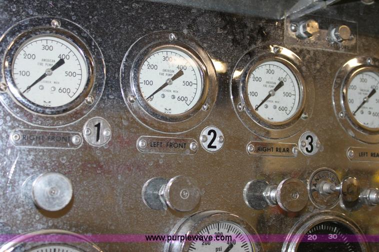 image for item 6319 1975 Ford 900 ladder truck