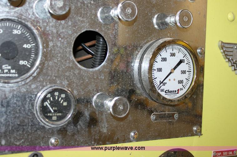 image for item 6319 1975 Ford 900 ladder truck