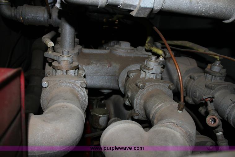 image for item 6319 1975 Ford 900 ladder truck