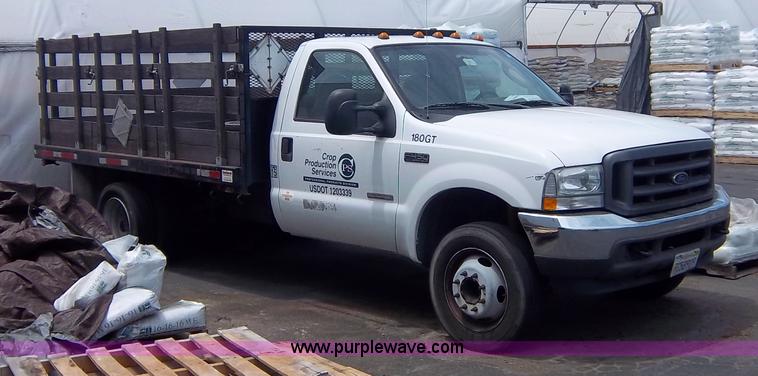 image for item 1000 2004 Ford F450 flatbed truck