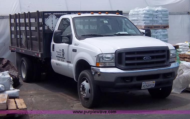 image for item 1000 2004 Ford F450 flatbed truck