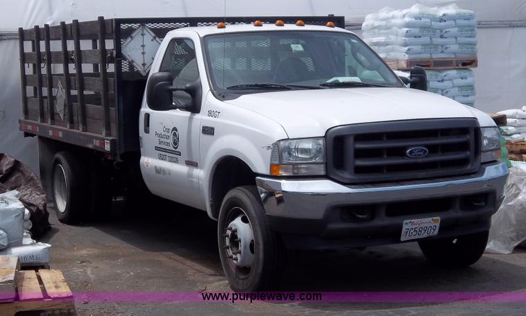 image for item 1000 2004 Ford F450 flatbed truck