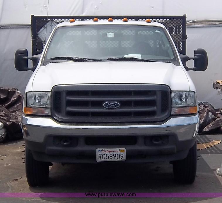 image for item 1000 2004 Ford F450 flatbed truck