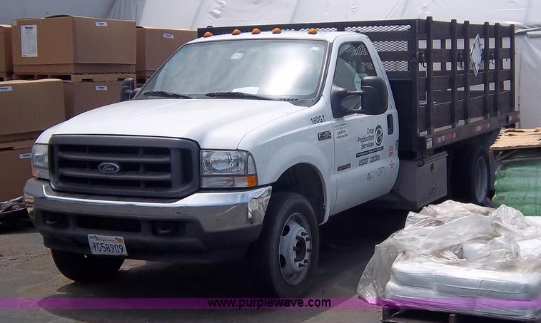 image for item 1000 2004 Ford F450 flatbed truck