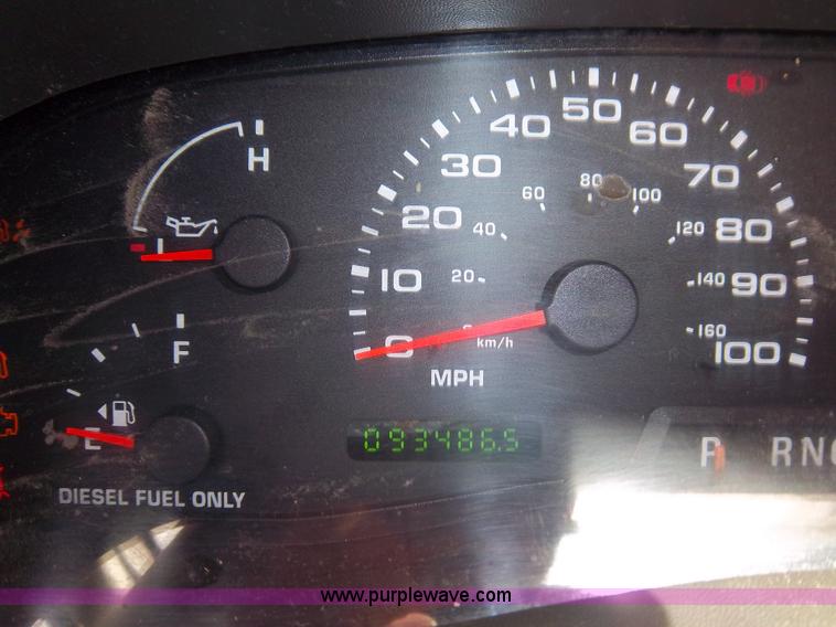 image for item 1000 2004 Ford F450 flatbed truck